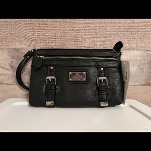 Brand new, never used Nicole by Nicole Miller.